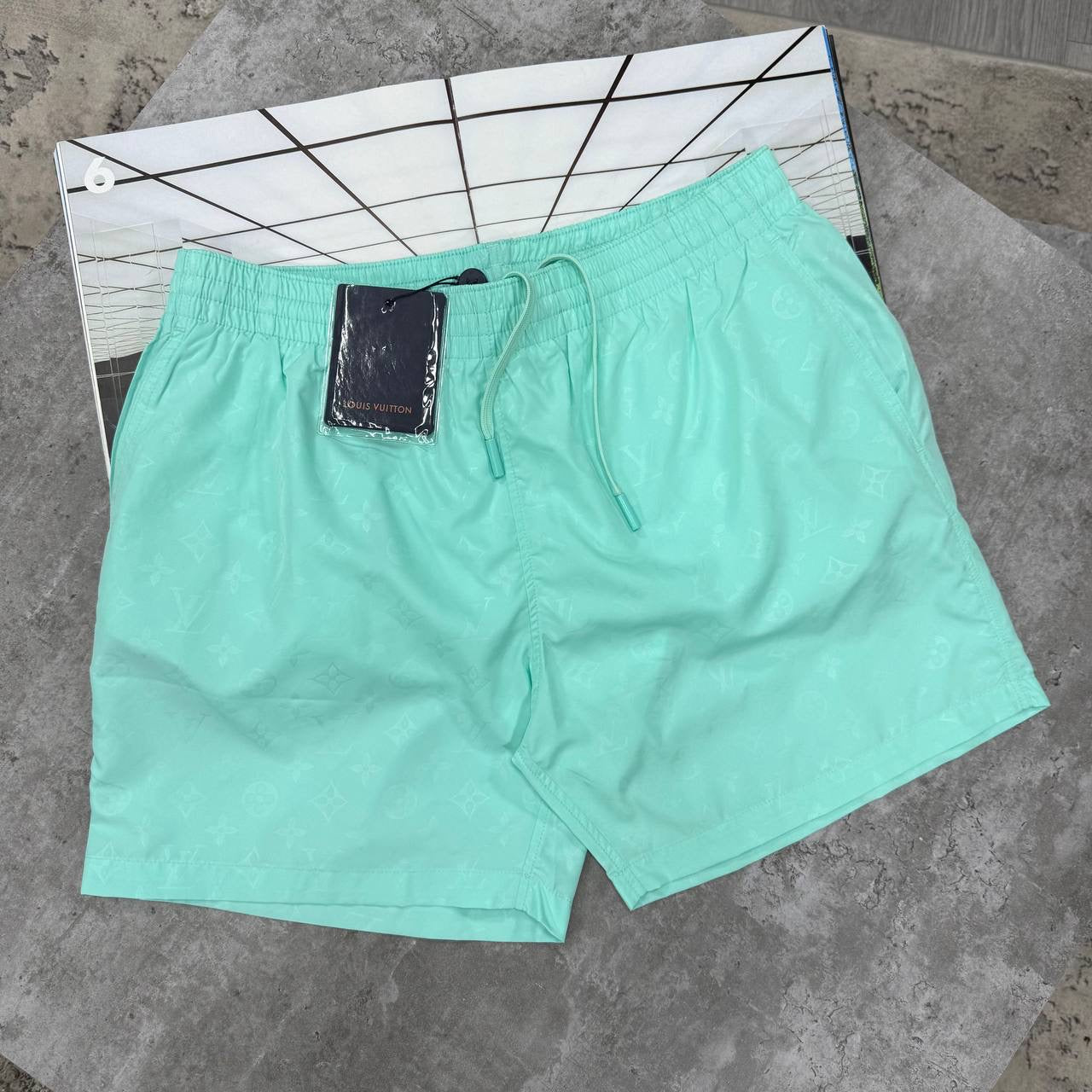 LVE MONOGRAM SWIM SHORTS - LIGHT GREEN