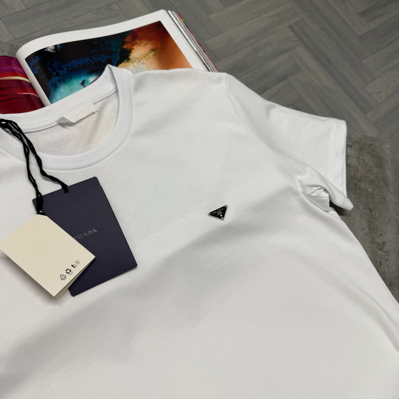 PDA SMALL SILVER BADGE TSHIRT - WHITE