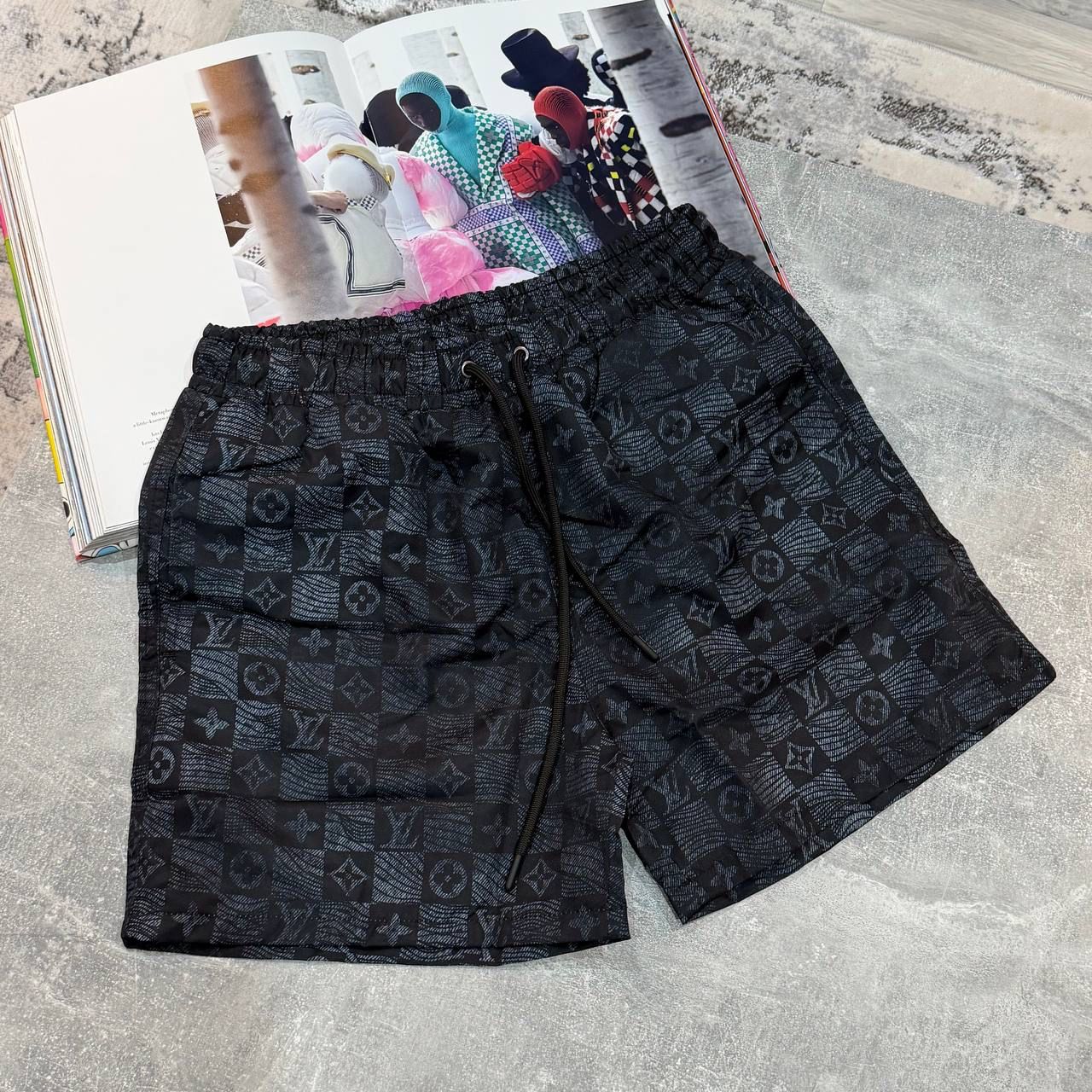 LVE MONOGRAM SWIM SHORTS - BLACK
