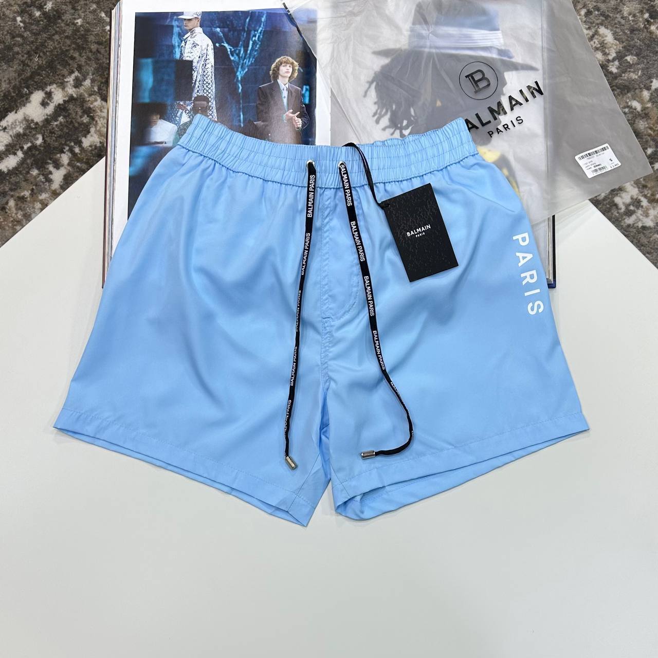 BLM SWIM SHORTS - SKY BLUE