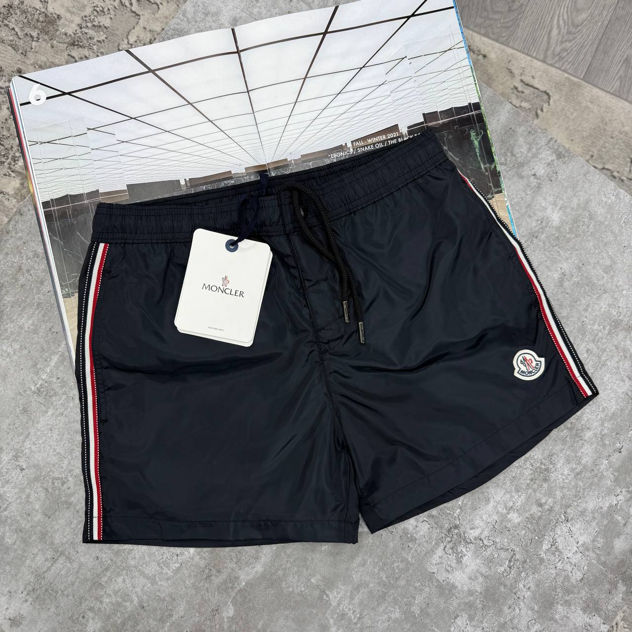 MNCLR STRIPED LOGO SWIM SHORTS - BLACK