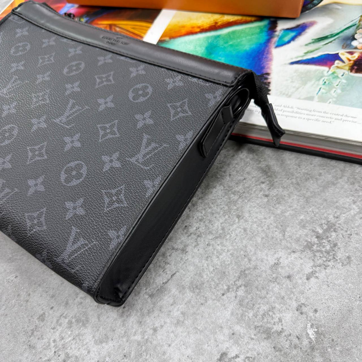 LVE MONOGRAM POUCH BAG - BLACK